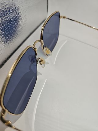 Gafas Levis azules y doradas