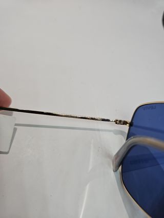Gafas Levis azules y doradas