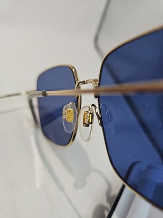 Gafas Levis azules y doradas