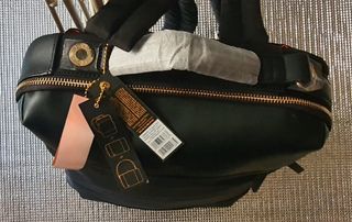 Maletín bandolera y mochila negro