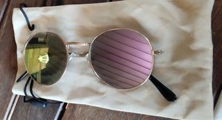 Gafas sol redondas doradas