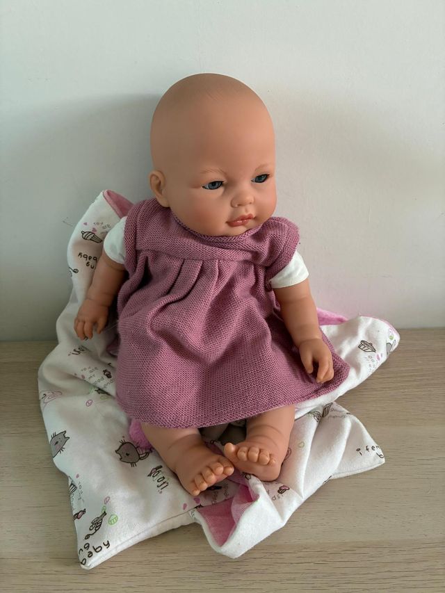 Muñeco bebé y manta