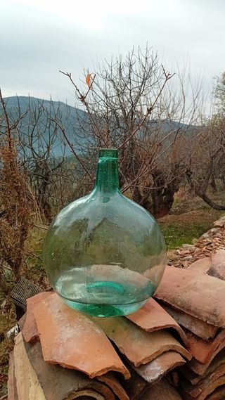 Damajuana de vidrio verde