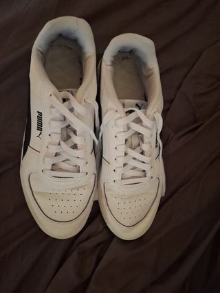 Zapatillas Puma blancas y negras