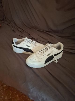 Zapatillas Puma blancas y negras