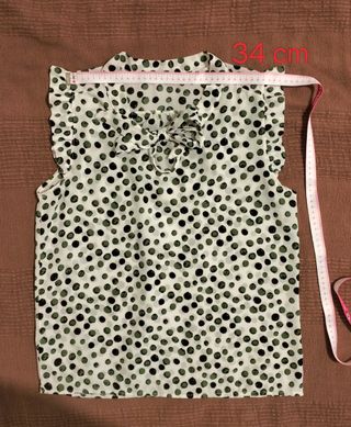 Blusa pois verde oliva e bianco
