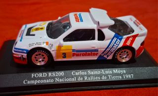 2 coches Carlos sainz Toyota y Ford rs200 1.43 