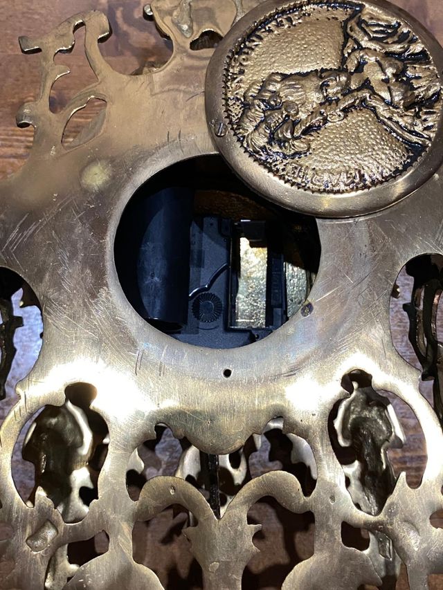 Reloj Bronce estilo antiguo.