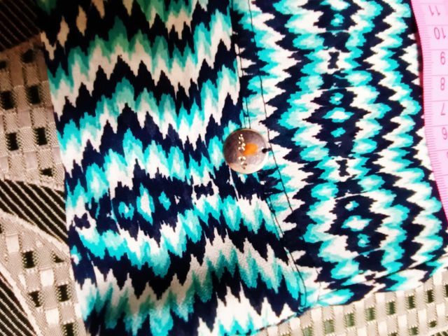 Casacca leggera turquoise e bianca