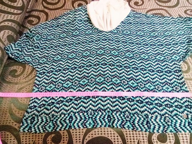 Casacca leggera turquoise e bianca