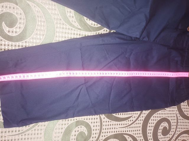 Pantalone gamba larga con mis. Sotto ginocchio 