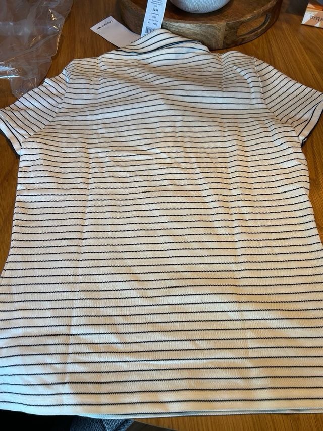 Polo Lacoste rayas blancas y azul marino. Auténtio