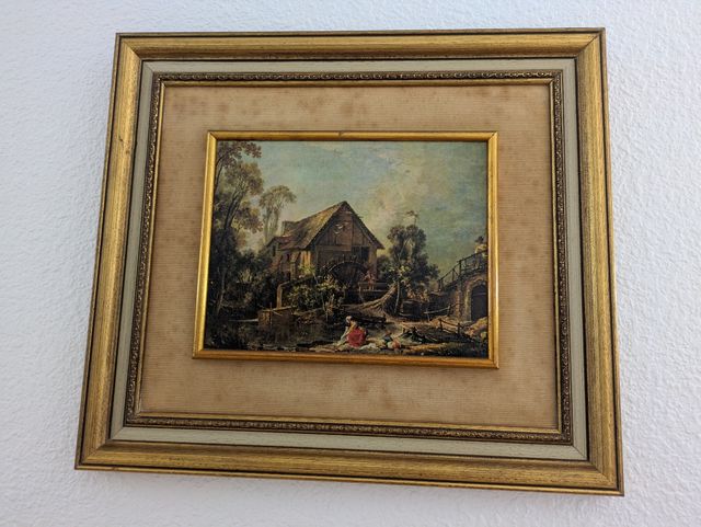 Cuadro clásico enmarcado dorado