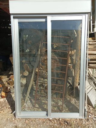 Ventana aluminio corredera y persiana