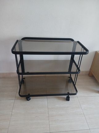 Camarera de cristal vintage negro con ruedas.