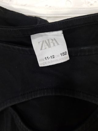Bodys niña: blanco de Sfera y negro de Zara 11-12 