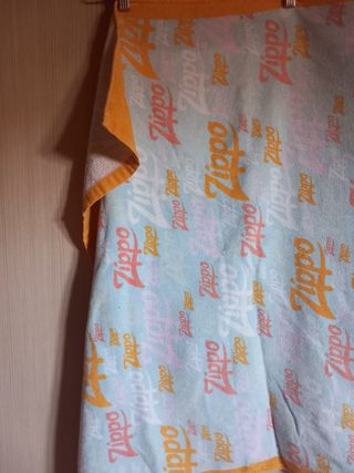 Telo mare Zippo azzurro, arancione e rosso