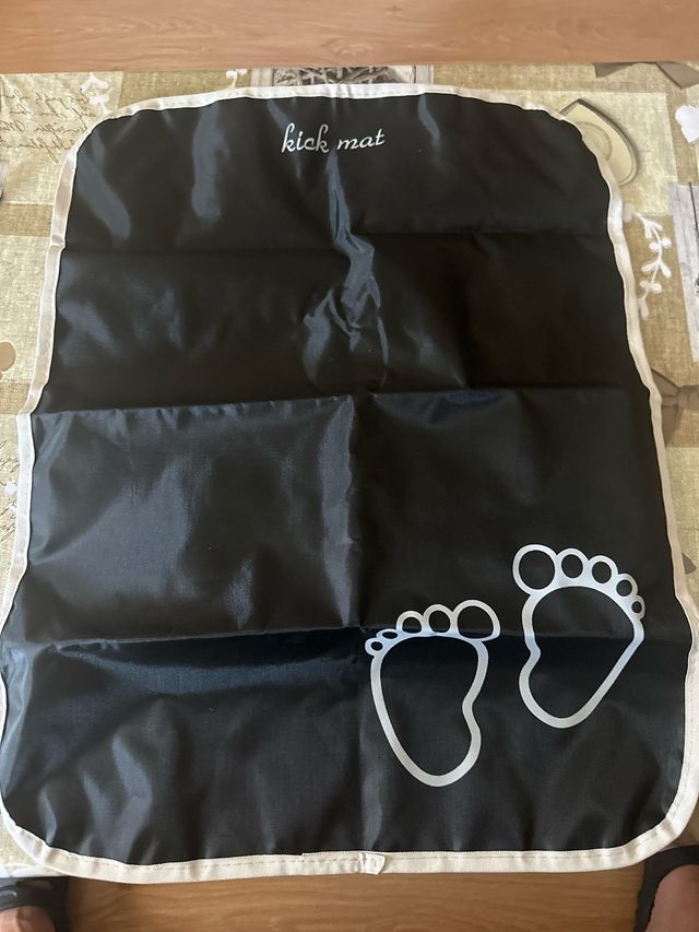 Protector asiento coche bebé