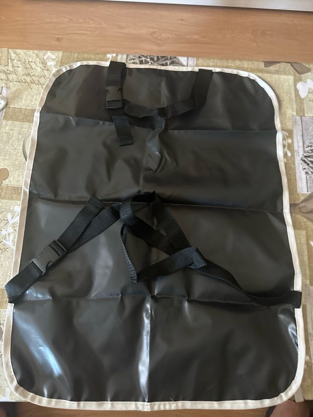 Protector asiento coche bebé