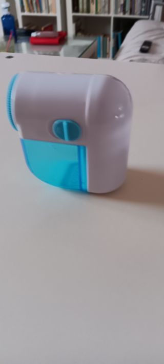 Quita pelusas eléctrico