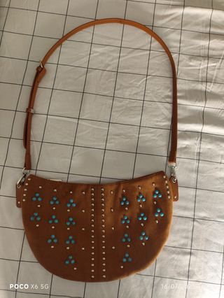 Bolso terciopelo un solo uso. En perfecto estado.