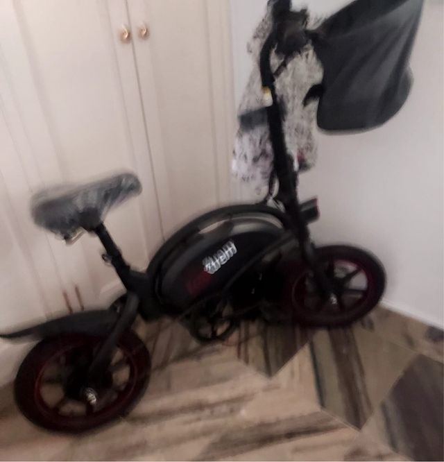 Bicicleta eléctrica plegable 12" -25km/h con cesto