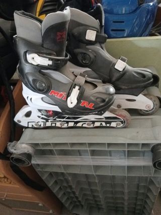 Patines línea niña, 2 pares  con su bolsa respecti