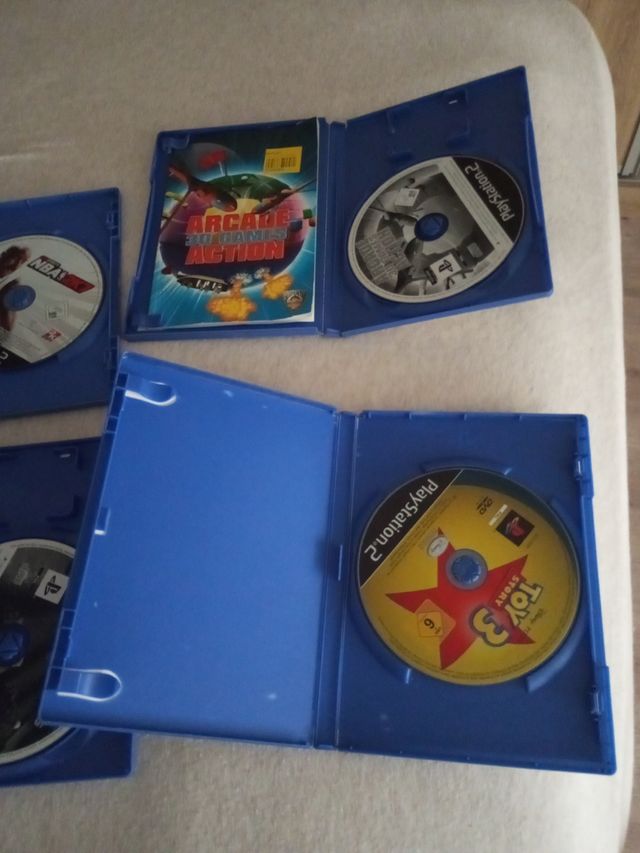 4 giochi PS2: NBA 2k7, Toy Story 3 e arcade 30 gam