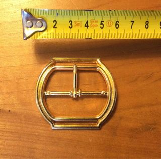 Set di 5 fibbie in metallo dorato