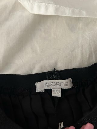 Falda negra plisada c/ elástico