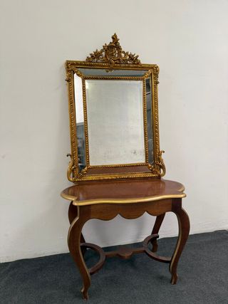 Fantastico specchio dorato con pennacchio,