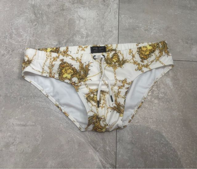 Bañador Zara oro blanco L/XL.