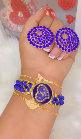 Juego de reloj y joyas azul y dorado