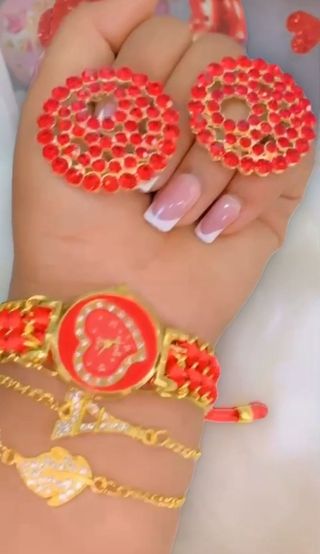 Juego de reloj y joyas azul y dorado