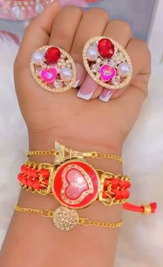 Juego de reloj y joyas azul y dorado