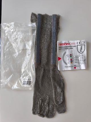Guante carnicero metálico nuevo .