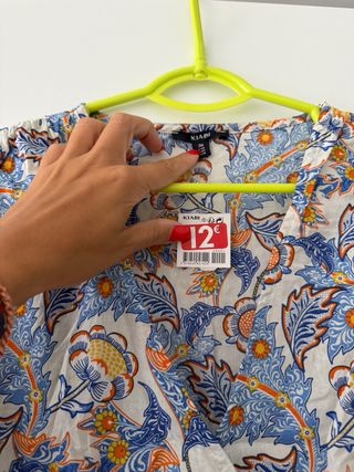 Vestido Kiabi azul estampado con etiqueta