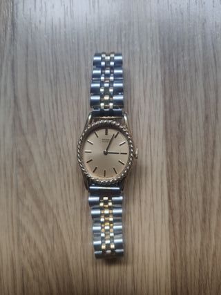 Reloj Seiko dorado y plateado