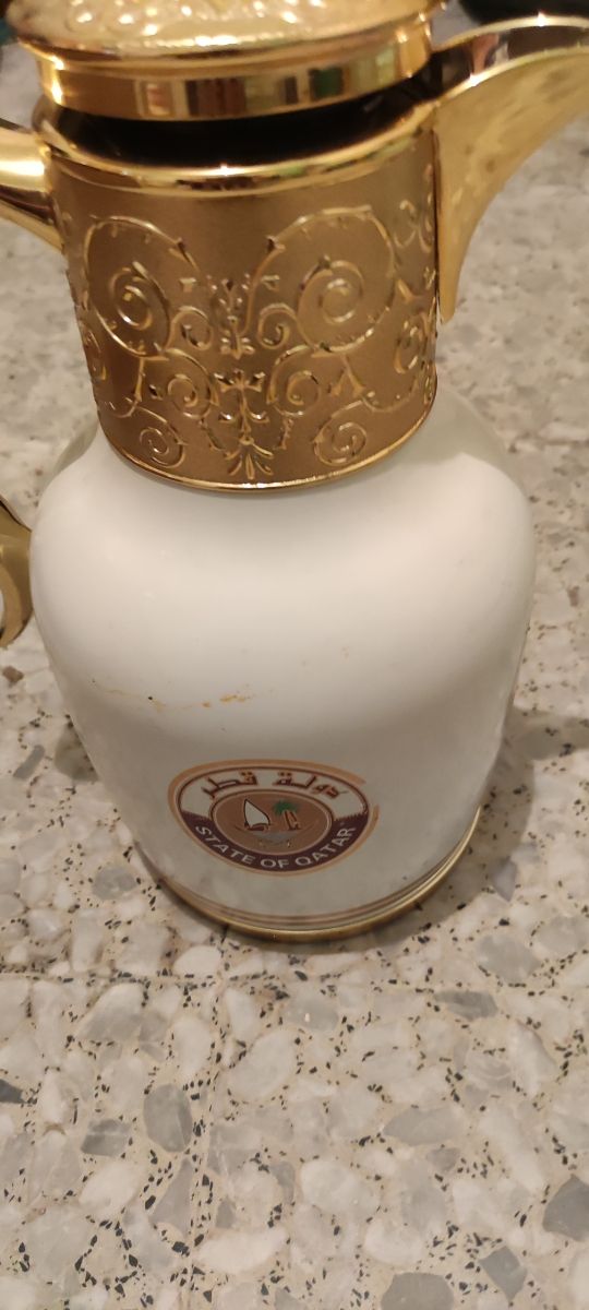 Cafetera térmica dorada