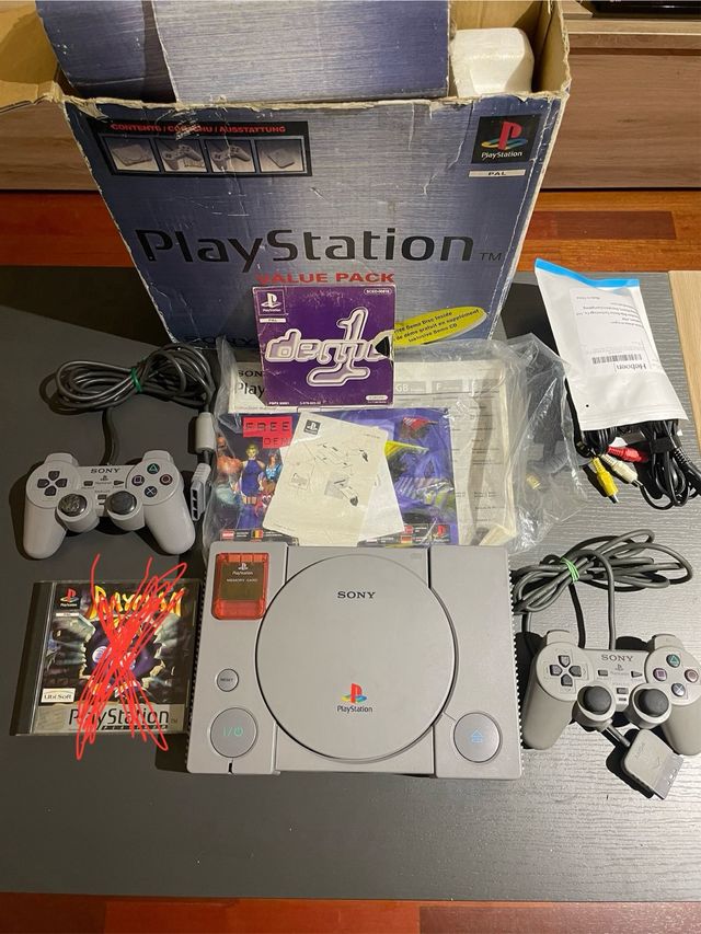 Pacchetto Value per PlayStation 1 + giochi + 2 controller