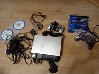 PS2 (PlayStation 2) + 2 mandos + eye + 30 juegos