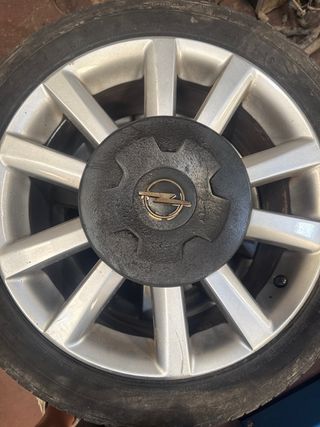 Tapacubos Opel Astra G