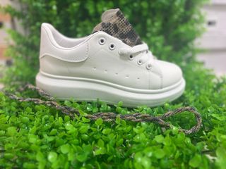 Sneakers pitonate bianche
dal 38 al 40