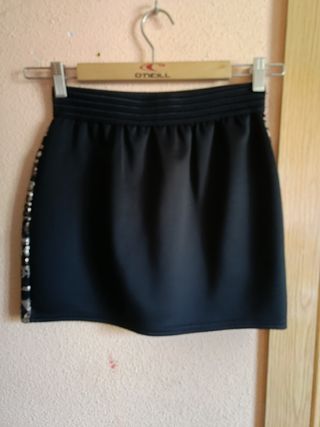 Minifalda negra y dorada lentejuelas