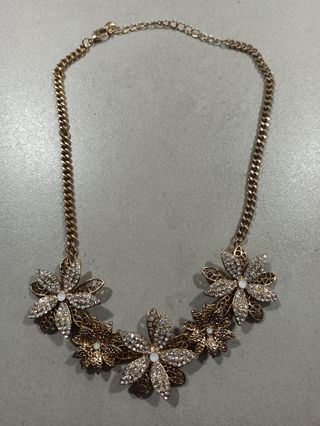 Collar dorado Sfera - Flores brillantes