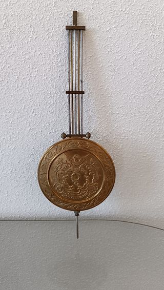 Péndulo antiguo dorado