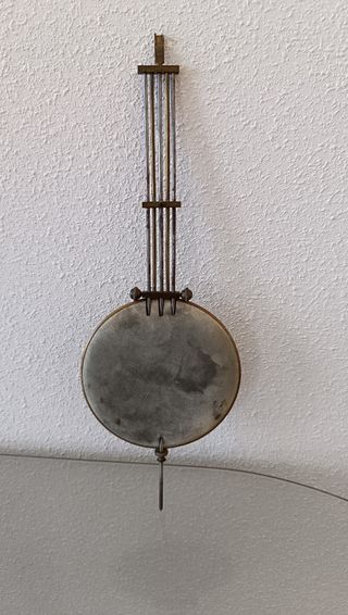 Péndulo antiguo dorado