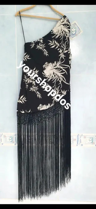 Top asimétrico flecos T-M ZARA