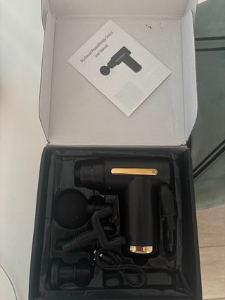 Pistola de masaje muscular