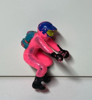 Antiguo motorista juguete